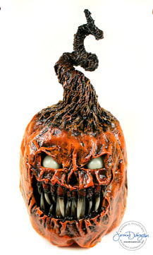 Jessica Dwergsten's orange Halloween jack o lantern with teeth.
